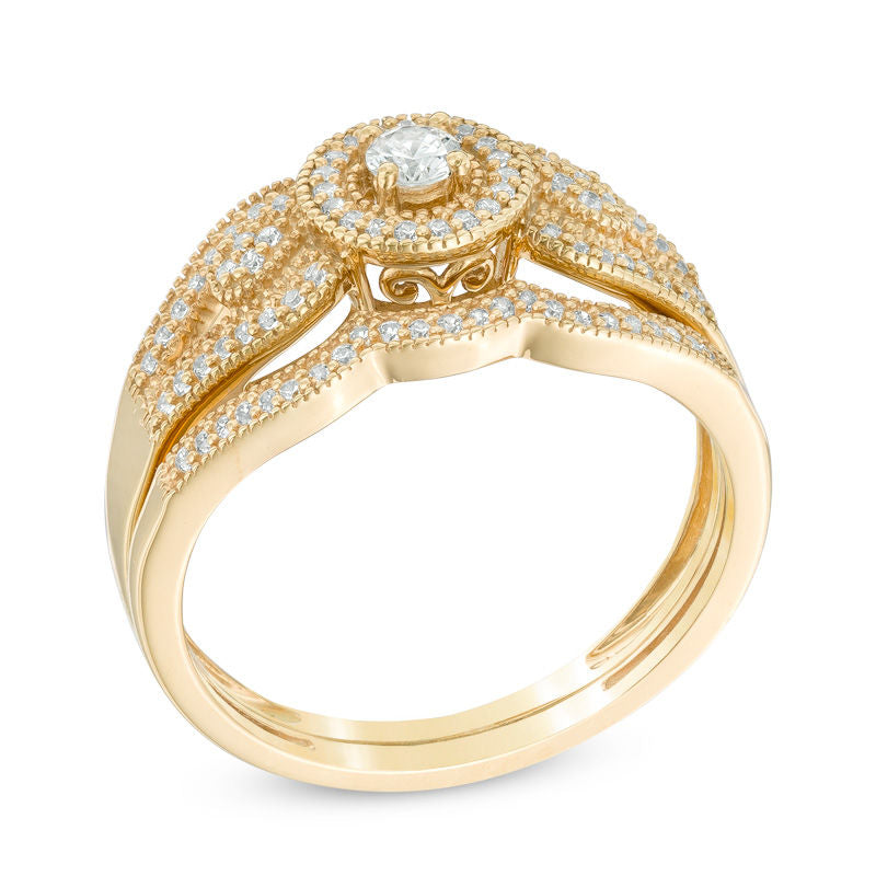1/4 CT. T.W. Diamond Halo Vintage-Style Bridal Engagement Ring Set in 14K Yellow Gold