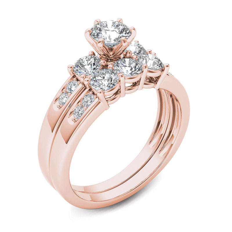 1-1/2 CT. T.W. Diamond Three Stone Bridal Engagement Ring Set in 14K Rose Gold
