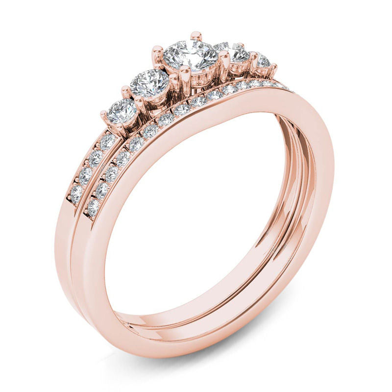 1/2 CT. T.W. Diamond Five Stone Bridal Engagement Ring Set in 14K Rose Gold