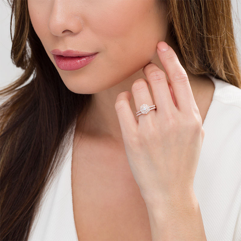 1/2 CT. T.W. Diamond Flower Frame Bridal Engagement Ring Set in 14K Rose Gold