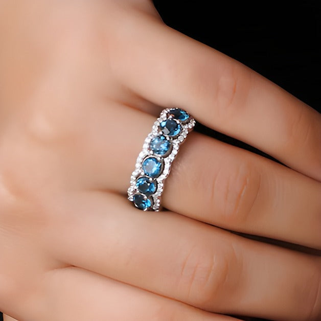 4.0mm London Blue Topaz and White Lab-Created Zircon Scallop Border Seven Stone Ring in Sterling Silver