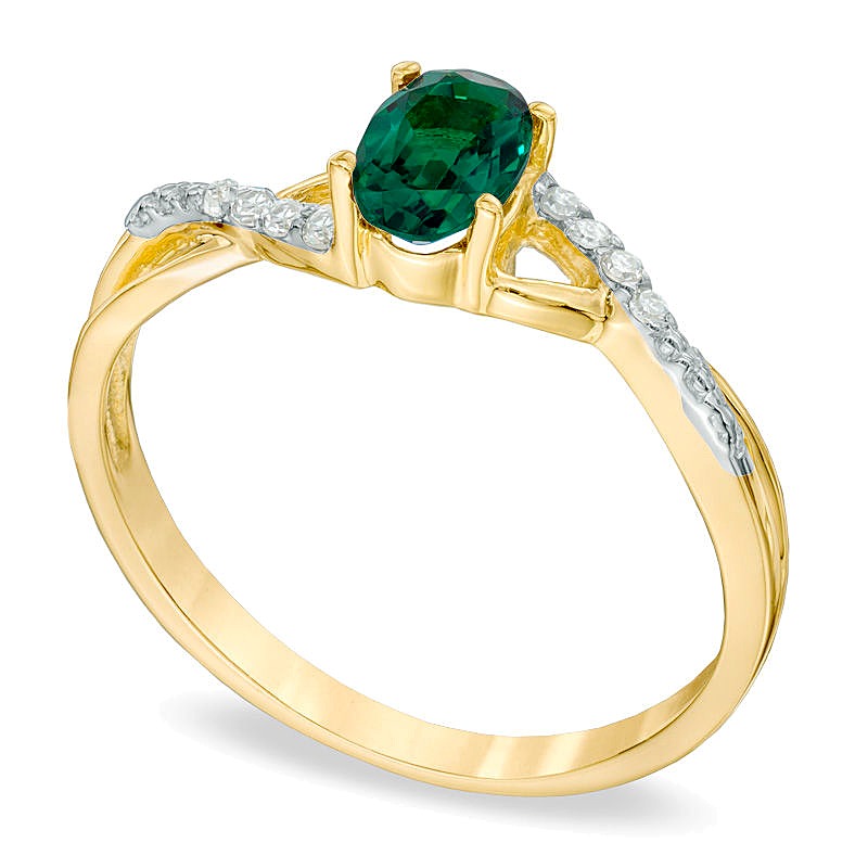 Oval Lab-Created Emerald and Diamond Accent Twist Engagement Ring in 10K Gold