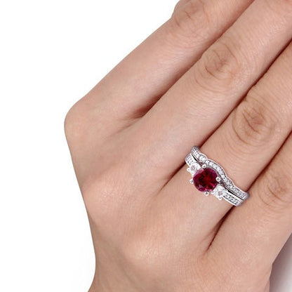 6.0mm Lab-Created Ruby and White Sapphire with 0.13 CT. TW Diamond Three Stone Bridal Set in 10K White Gold