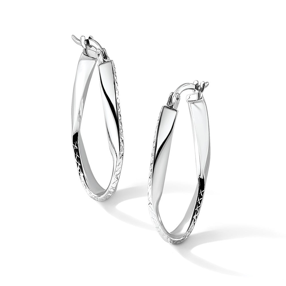 10K White Gold Polished And D/C Oval Hoop Earrings