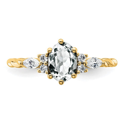 14K Yellow Gold Diamond and 7x5 Oval April/ Topaz Size 7 Twisted Ring