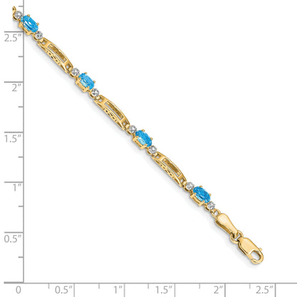 10K Yellow Gold Diamond And Blue Topaz Bracelet