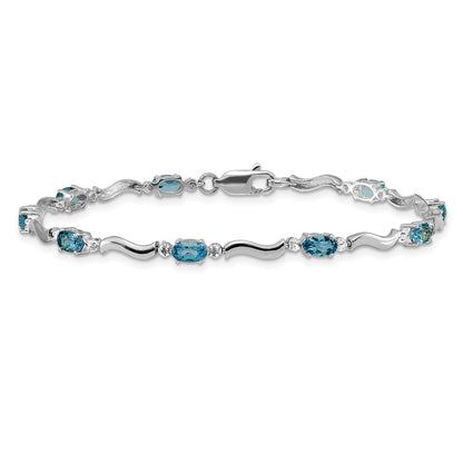 10K White Gold Fancy Diamond And Blue Topaz Bracelet