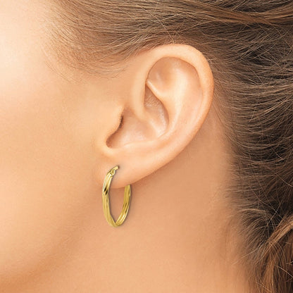 14K Yellow Gold Polished And Grooved Twist Oval Hoop Earrings