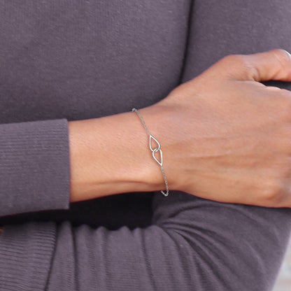 Sterling Silver Ss Rh Plated Polish Intertwined Teardrop 1In Ext. Bracelet