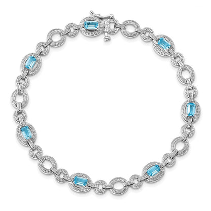7 Inch Sterling Silver Rhodium-Plated Dia. & Lt Swiss Blue Topaz Oval Bracelet