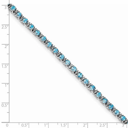 7 Inch Sterling Silver Rhodium-Plated Blue Topaz And Diamond Bracelet
