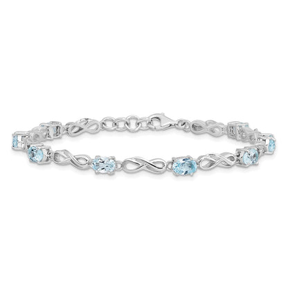 7 Inch Sterling Silver Rhodium-Plated Blue Topaz Figure 8 Bracelet