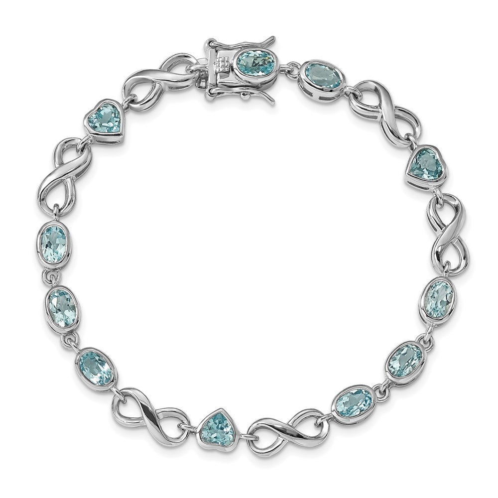 7 Inch Sterling Silver Rhodium-Plated Oval Heart Blue Topaz Bracelet