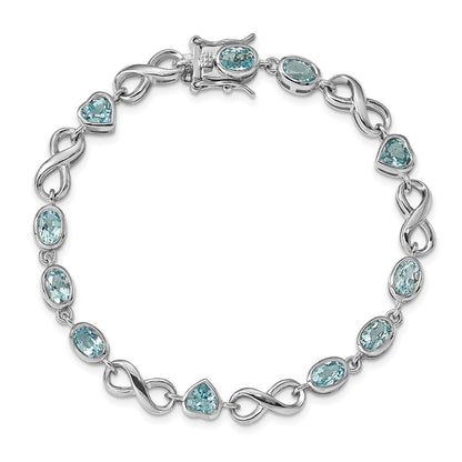 7 Inch Sterling Silver Rhodium-Plated Oval Heart Blue Topaz Bracelet