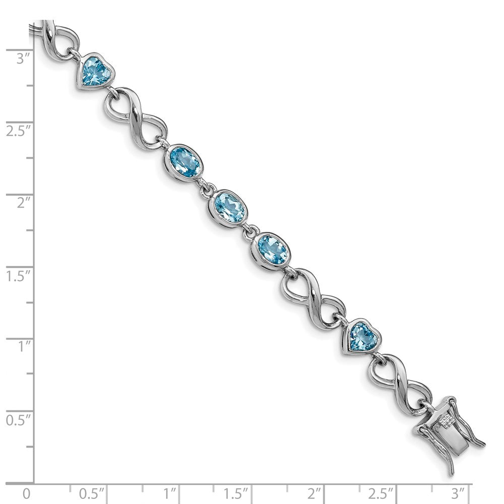 7 Inch Sterling Silver Rhodium-Plated Oval Heart Blue Topaz Bracelet