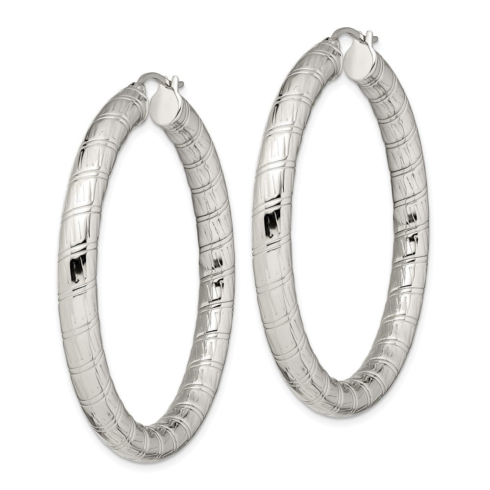 Stainless Steel Polished And Textured Hollow Hoop Earrings