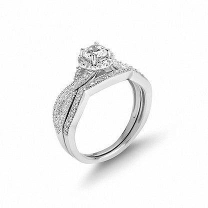 3/4 CT. T.W. Diamond Twist Shank Bridal Set in 14K White Gold