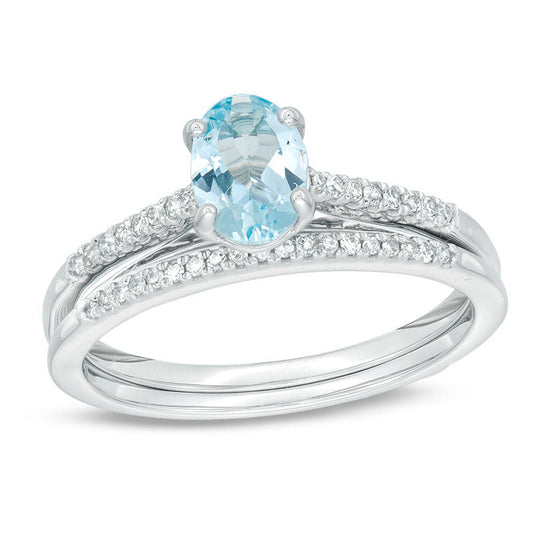 Oval-Shaped Aquamarine and 1/8 CT. T.W. Diamond Bridal Engagement Ring Set in 14K White Gold