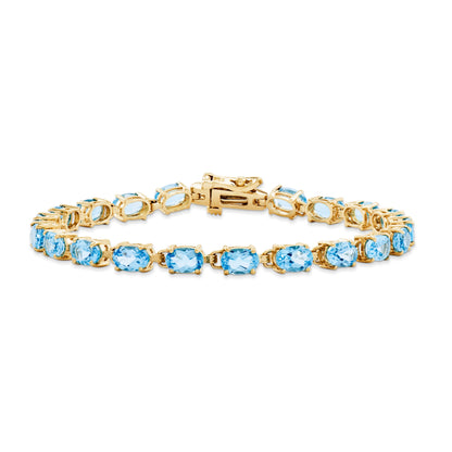 14K Yellow Gold 6X4mm Oval Blue Topaz Bracelet