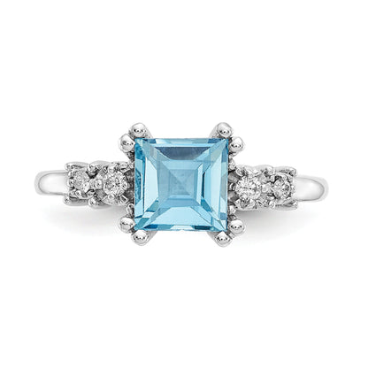 14K White Gold Diamond And Blue Topaz Ring