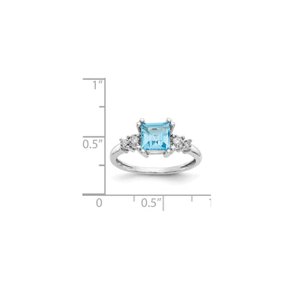 14K White Gold Diamond And Blue Topaz Ring