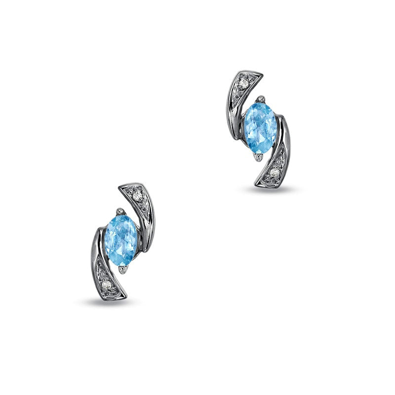 5.0mm Oval Aquamarine and 0.05 CT. T.W. Diamond Boomerang Earrings in 10K White Gold