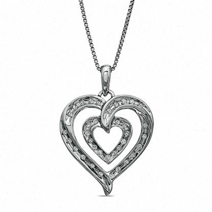 0.13 CT. T.W. Natural Diamond Double Row Heart Pendant in Sterling Silver