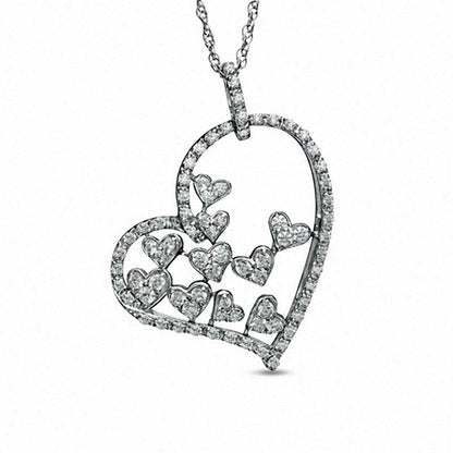 0.5 CT. T.W. Natural Diamond Fluttering Heart Pendant in Sterling Silver