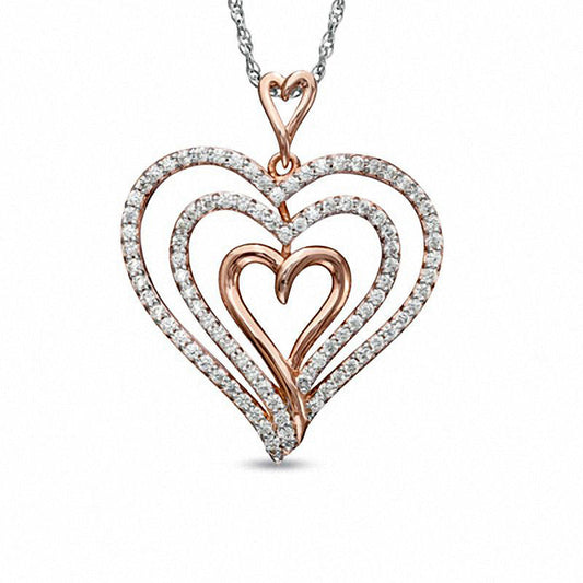 0.25 CT. T.W. Natural Diamond Layered Heart Pendant in Sterling Silver with Rose Rhodium