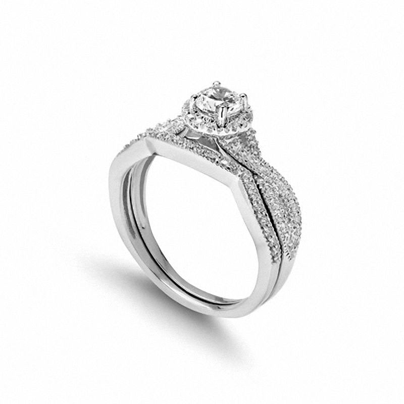 0.75 CT. T.W. Natural Diamond Twist Shank Bridal Engagement Ring Set in Solid 14K White Gold