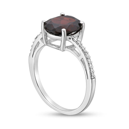 Oval Garnet and Natural Diamond Accent Ring in Sterling Silver