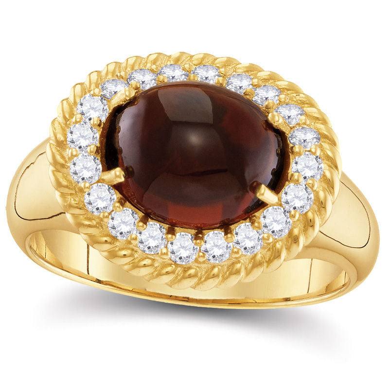 Oval Garnet and 0.38 CT. T.W. Natural Diamond Rope Frame Ring in Solid 10K Yellow Gold