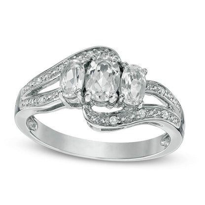 Oval White Topaz Three Stone Bypass Ring in Sterling Silver