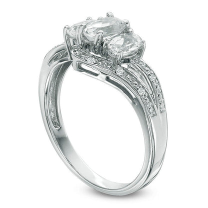 Oval White Topaz Three Stone Bypass Ring in Sterling Silver