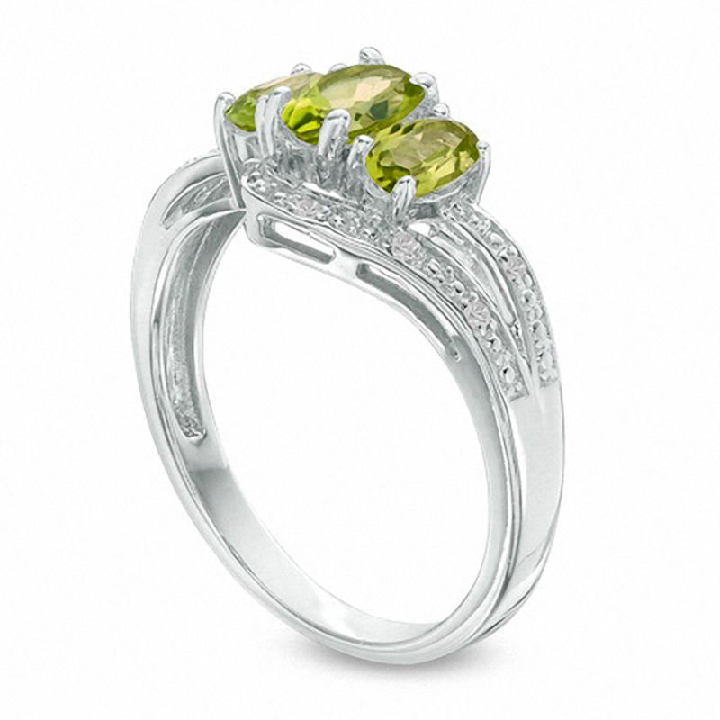 Oval Peridot and White Topaz Three Stone Bypass Ring in Sterling Silver