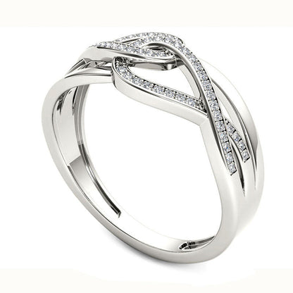 0.13 CT. T.W. Natural Diamond Interlocking Loops Twist Ring in Solid 10K White Gold