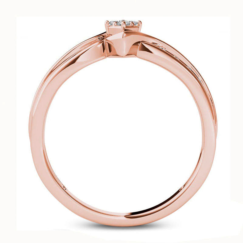 0.10 CT. T.W. Quad Natural Diamond Marquise Bypass Ring in Solid 10K Rose Gold