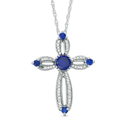 5.0mm Lab-Created Blue Sapphire and 0.2 CT. T.W. Diamond Loop Cross Pendant in Sterling Silver