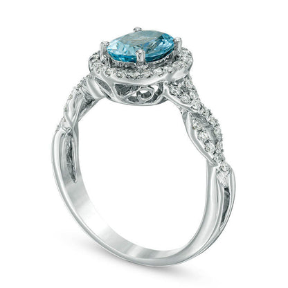 Oval Aquamarine and 0.20 CT. T.W. Natural Diamond Frame Twist Shank Ring in Solid 14K White Gold - Size 7