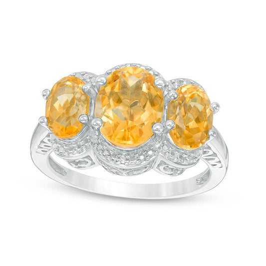 Oval Citrine and Natural Diamond Accent Three Stone Frame Ring in Sterling Silver