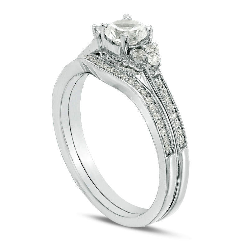 Lab-Created White Sapphire and 0.10 CT. T.W. Diamond Tri-Sides Bridal Engagement Ring Set in Sterling Silver