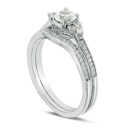 Lab-Created White Sapphire and 0.10 CT. T.W. Diamond Tri-Sides Bridal Engagement Ring Set in Sterling Silver