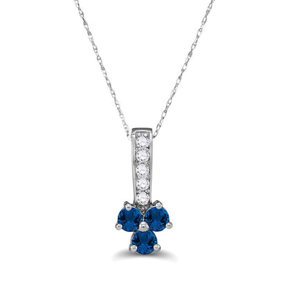 Blue Sapphire and 0.13 CT. T.W. Natural Diamond Trio Pendant in Sterling Silver