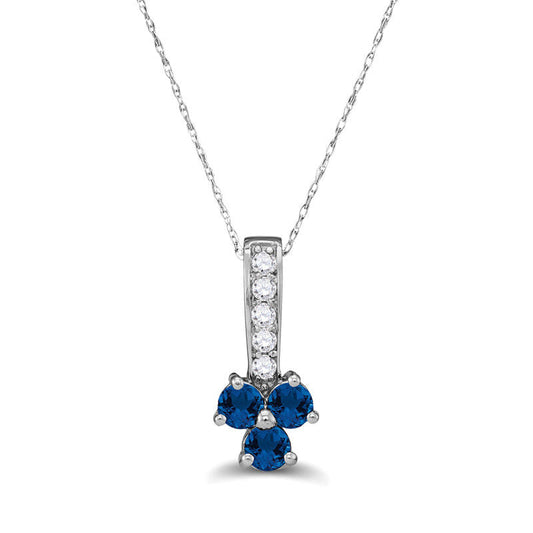 Blue Sapphire and 0.13 CT. T.W. Natural Diamond Trio Pendant in Sterling Silver