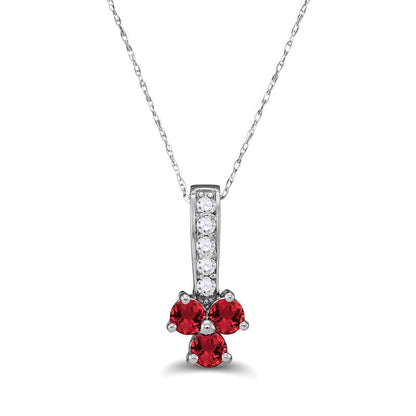 Lab-Created Ruby and 0.13 CT. T.W. Diamond Trio Pendant in Sterling Silver