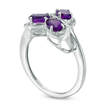 Oval Amethyst and Natural Diamond Accent Three Stone Swirl Ring in Sterling Silver