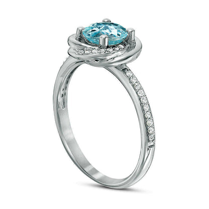 6.0mm Sky Blue Topaz and 0.17 CT. T.W. Natural Diamond Orbit Frame Ring in Solid 10K White Gold