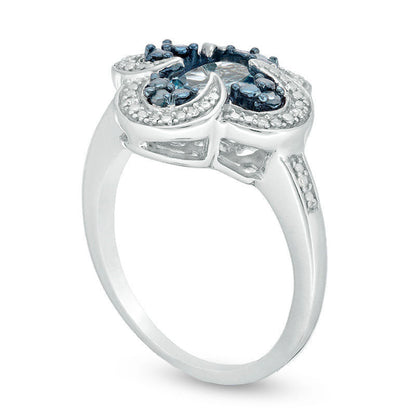 Oval Blue Topaz and 0.10 CT. T.W. Enhanced Blue and White Natural Diamond Swirl Frame Clover Ring in Sterling Silver