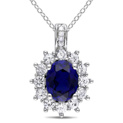 Oval Lab-Created Blue and White Sapphire Sunburst Frame Pendant in Sterling Silver with Diamond Accents