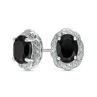 Oval Onyx and 0.05 CT. T.W. Diamond Pinwheel Frame Stud Earrings in Sterling Silver